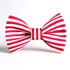 Red and white striped bow tie on a white background