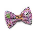 Halloween bowtie with candy in purple, pre-tied and adjustable.