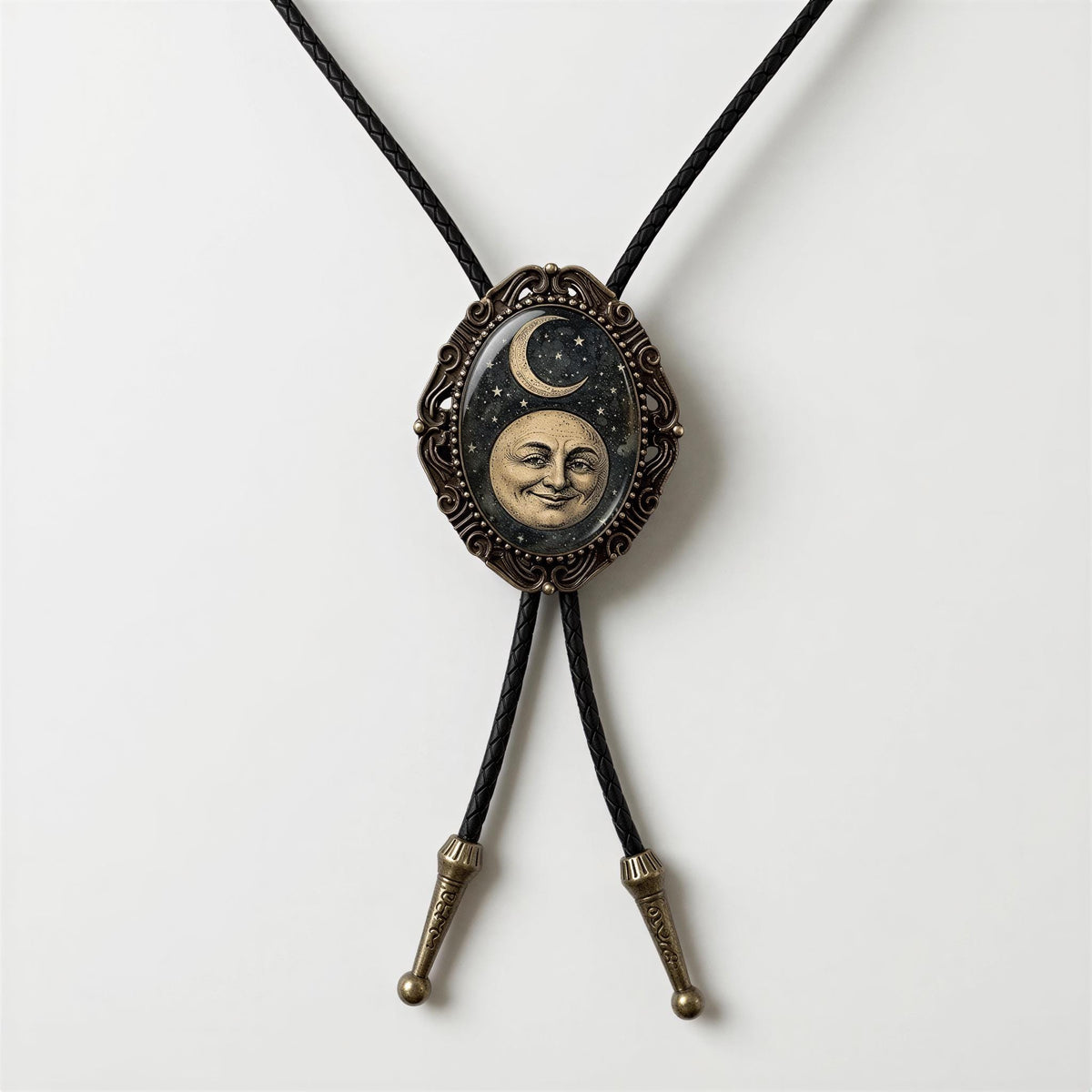 A decorative necklace with a pendant featuring a moon and crescent symbol, possibly representing the moon and the crescent moon.