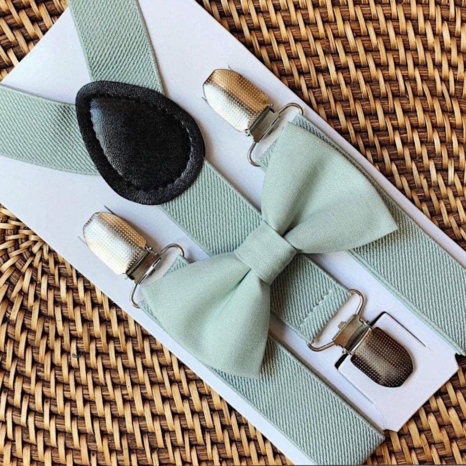 green bow tie and braces