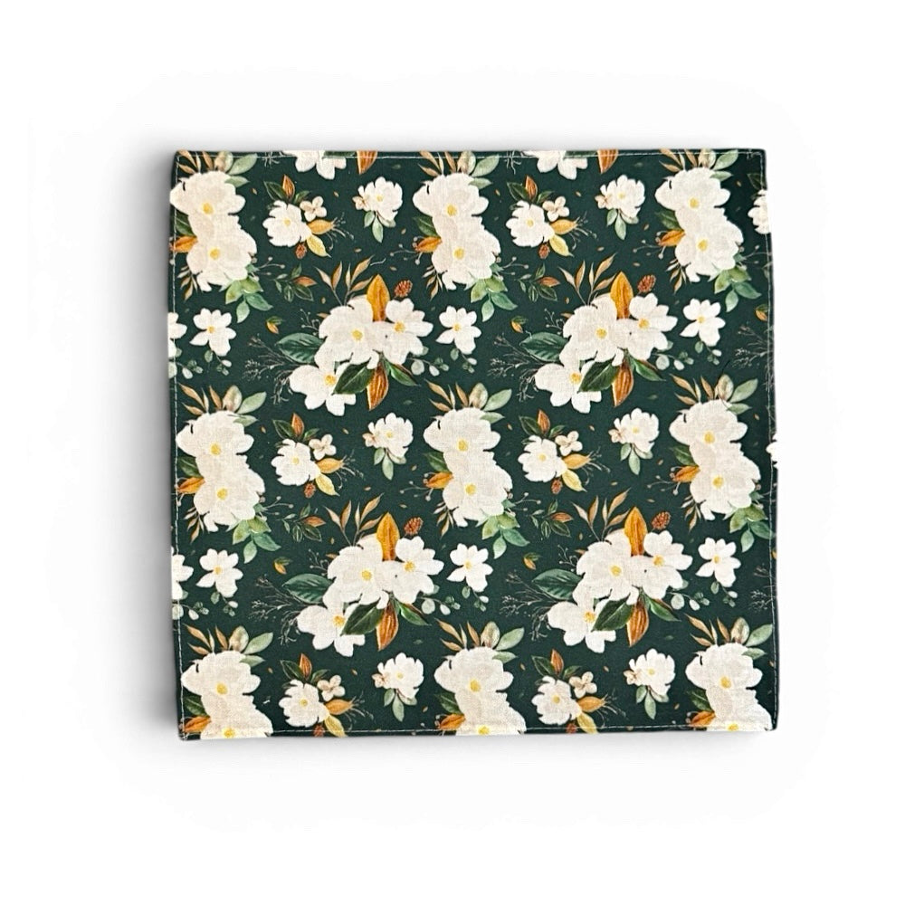 Emerald green floral pocket square a white background