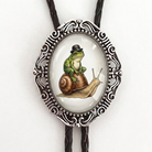 Bolo tie with frog and snail in silver and black leather cord.