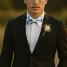 Dusty blue hydrangea bow tie worn by a groomsman in a wedding party.
