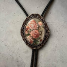 Wedding bolo tie with flowers with leather cords.