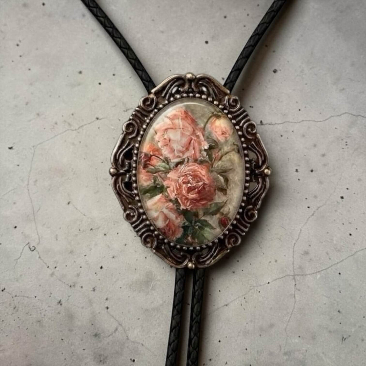Wedding bolo tie with flowers with leather cords.