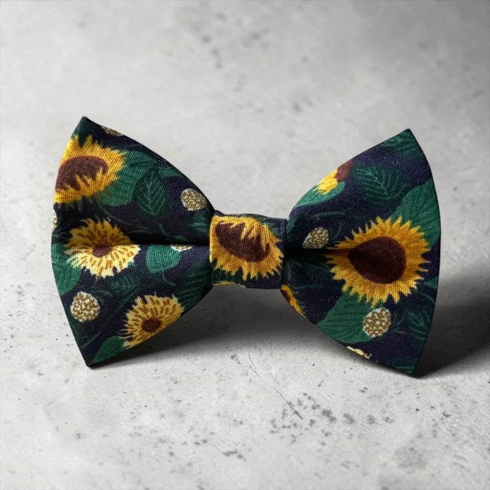 Floral Bow Tie for Men in Sunflower on concrete table