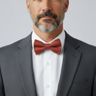 Burnt Orange Bow Tie in Sienna, worn by a groomsmen.