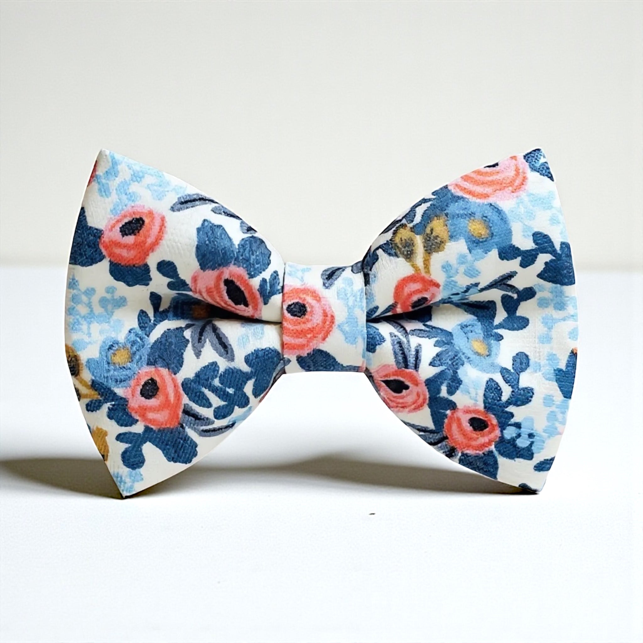 Floral bow tie on a white background for groomsmen, ring bearers and weddings.