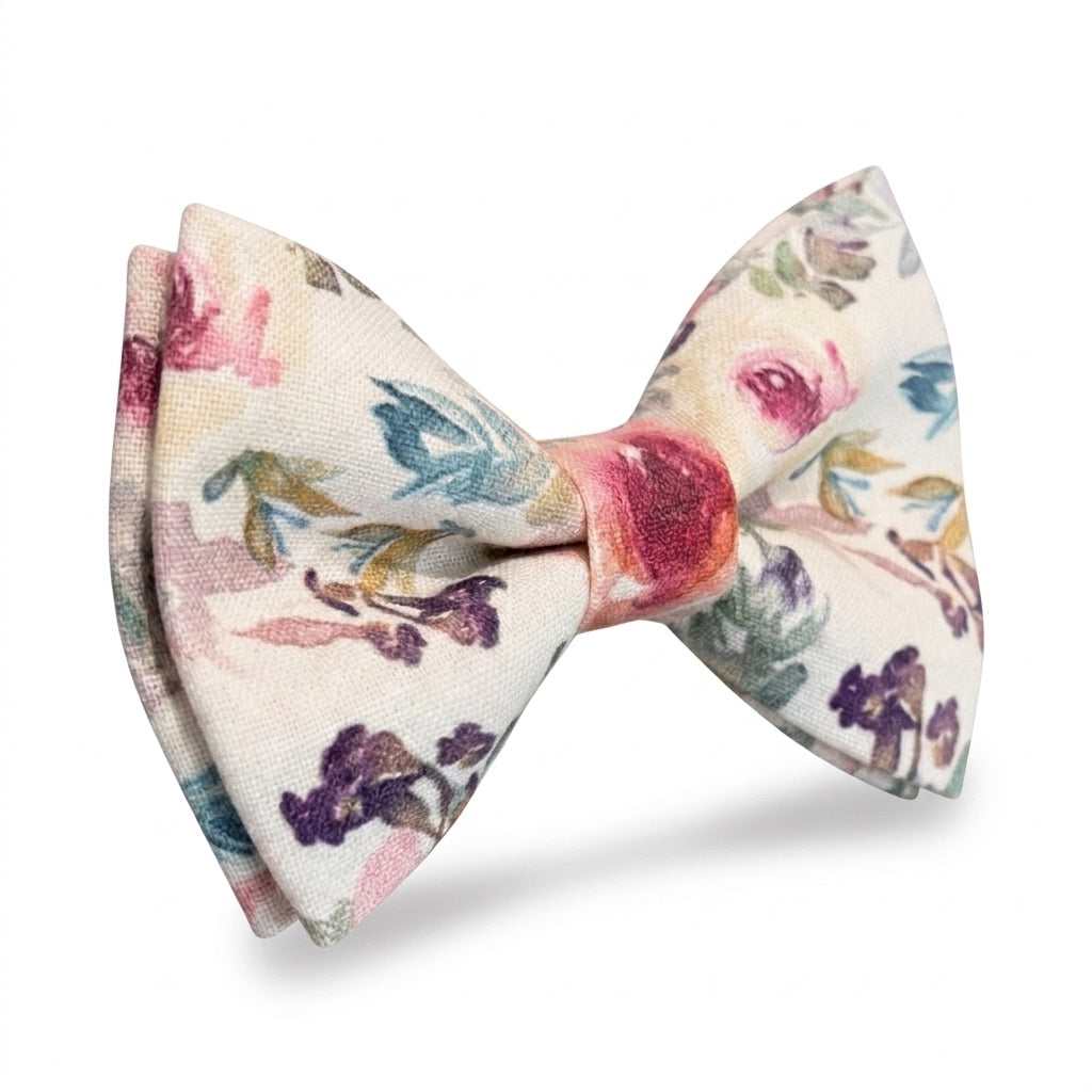 Men's botanical pattern pre-tied groomsmen bow tie featuring soft pastel colors and green foliage.