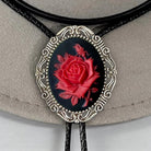 Bolo tie with red rose design on a beige hat