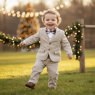 Red and White Tartan Plaid Bow Tie for Christmas being worn by a toddler.