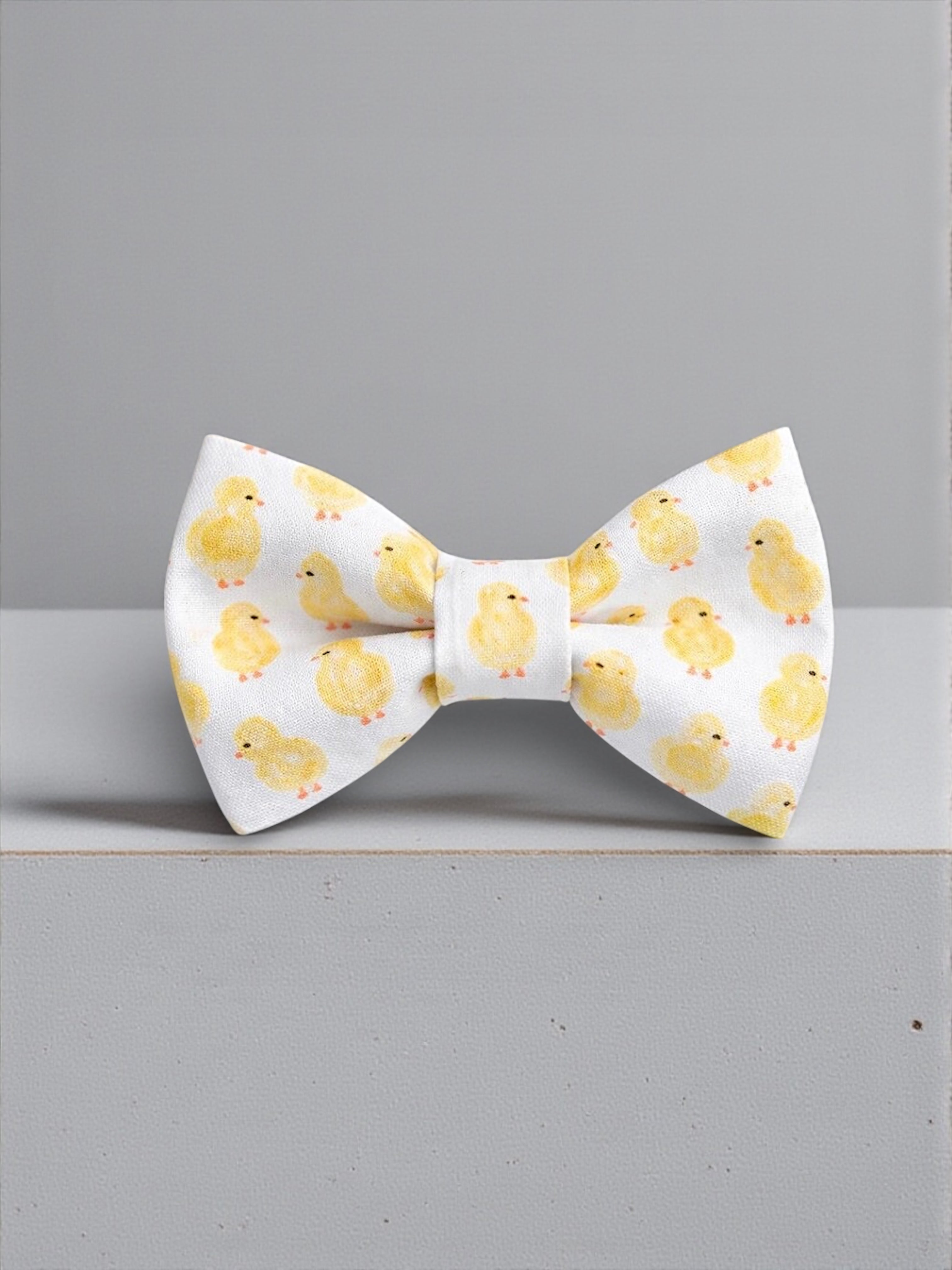 Yellow Chick Pattern Bow Ties, a Yellow Toddler Bowtie, and a Men’s Easter Bow Tie to show matching father and son spring accessories.