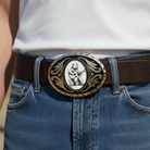 Bear belt buckle featuring a bear playing guitar on blue jeans.