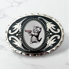 Kitten Belt Buckle Western Accessory on marble countertop