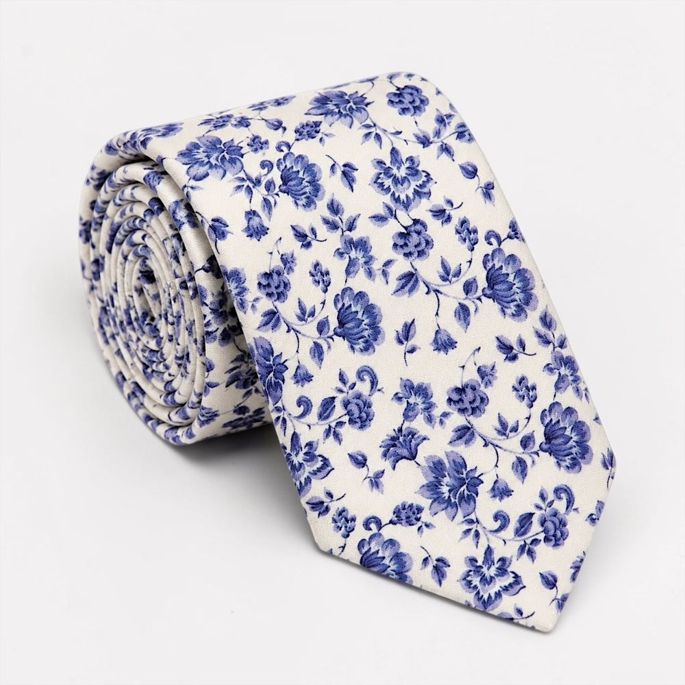 Blue floral tie for men and groomsmen in weddings.