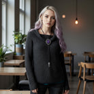 Bolo Tie- Gothic Black & Purple Rose Bolo tie worn by a woman in a coffee shop.