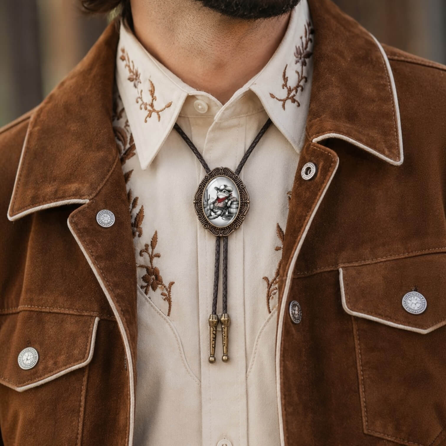Bolo Tie with Western Cowboy Toad featuring Leather Cord The Bold Bow Tie Worn by a man