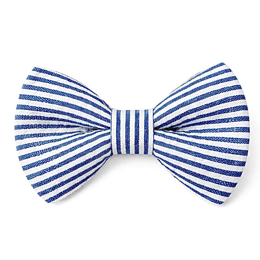Navy blue and white seersucker striped bow tie for Easter on a white background.