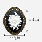 Decorative brooch with a white rose on a black background, shown with measurements on a white background.