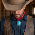 Cowboy wearing a Country Western Blue Bolo Tie.