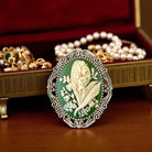Silver Lily of the Valley Brooch, Green May Flower Brooch Pin In front of a jewelry box