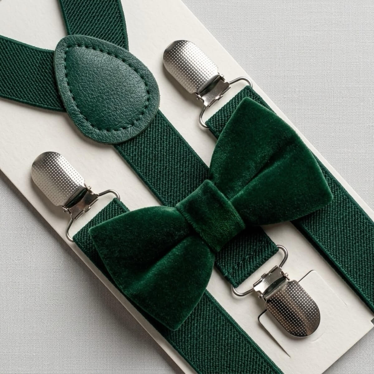 Green velvet bow tie and suspenders for Christmas.