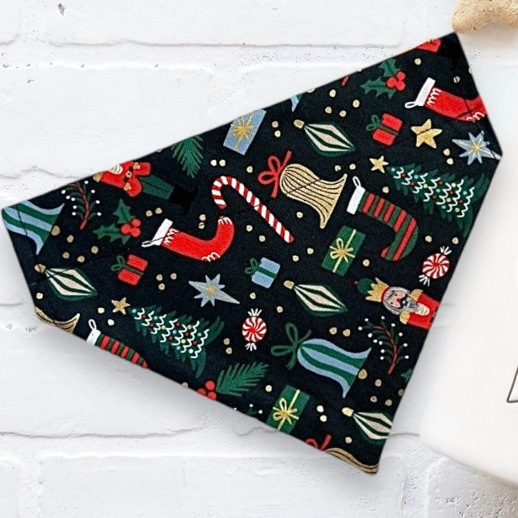 Christmas dog bandana with nutcracker on black red and green fabric from The Bold Bow Tie.