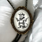 Otter bolo tie with genuine leather cord.