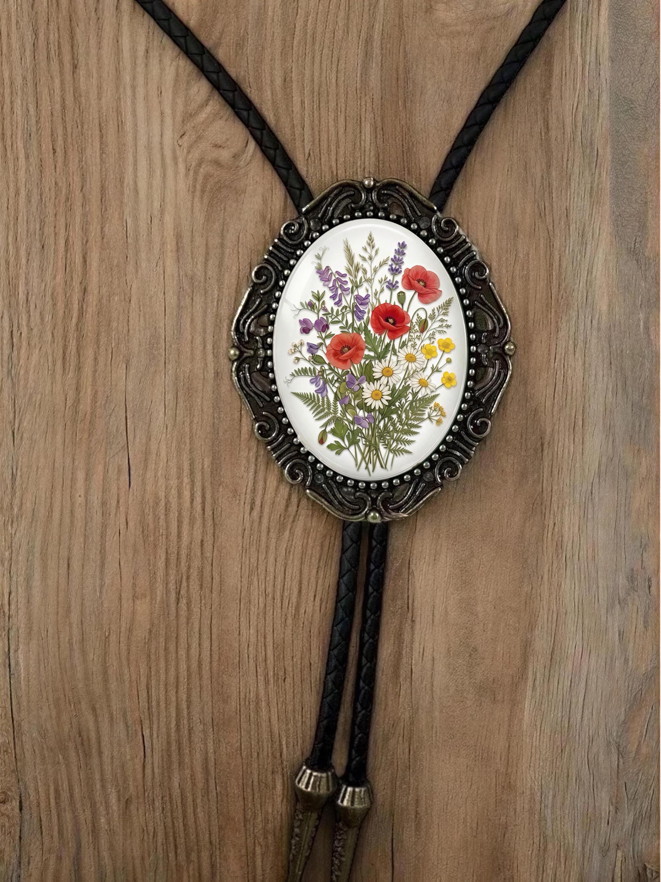 Floral bolo tie for wildflower wedding.