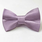 A purple satin bow tie is displayed against a white background.