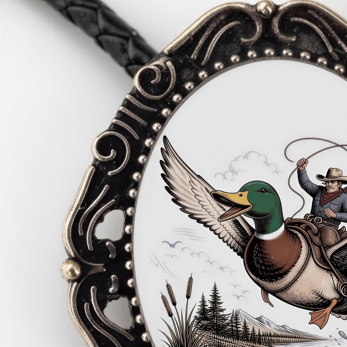 A decorative oval frame with a painting of a man riding a duck on a lasso, surrounded by a scenic landscape.