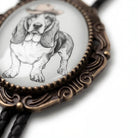 Bolo tie with dog image in a country western style.