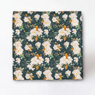 Emerald floral pocket square for groomsmen with a repeating floral pattern in shades of green and white.