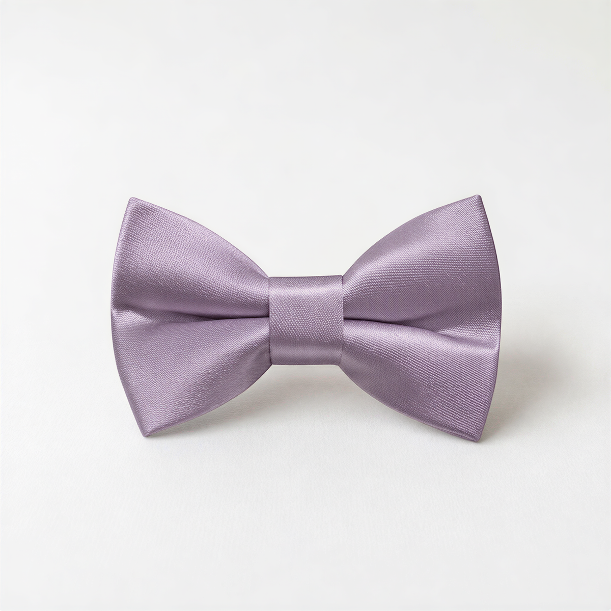 A purple satin bow tie is displayed against a white background.