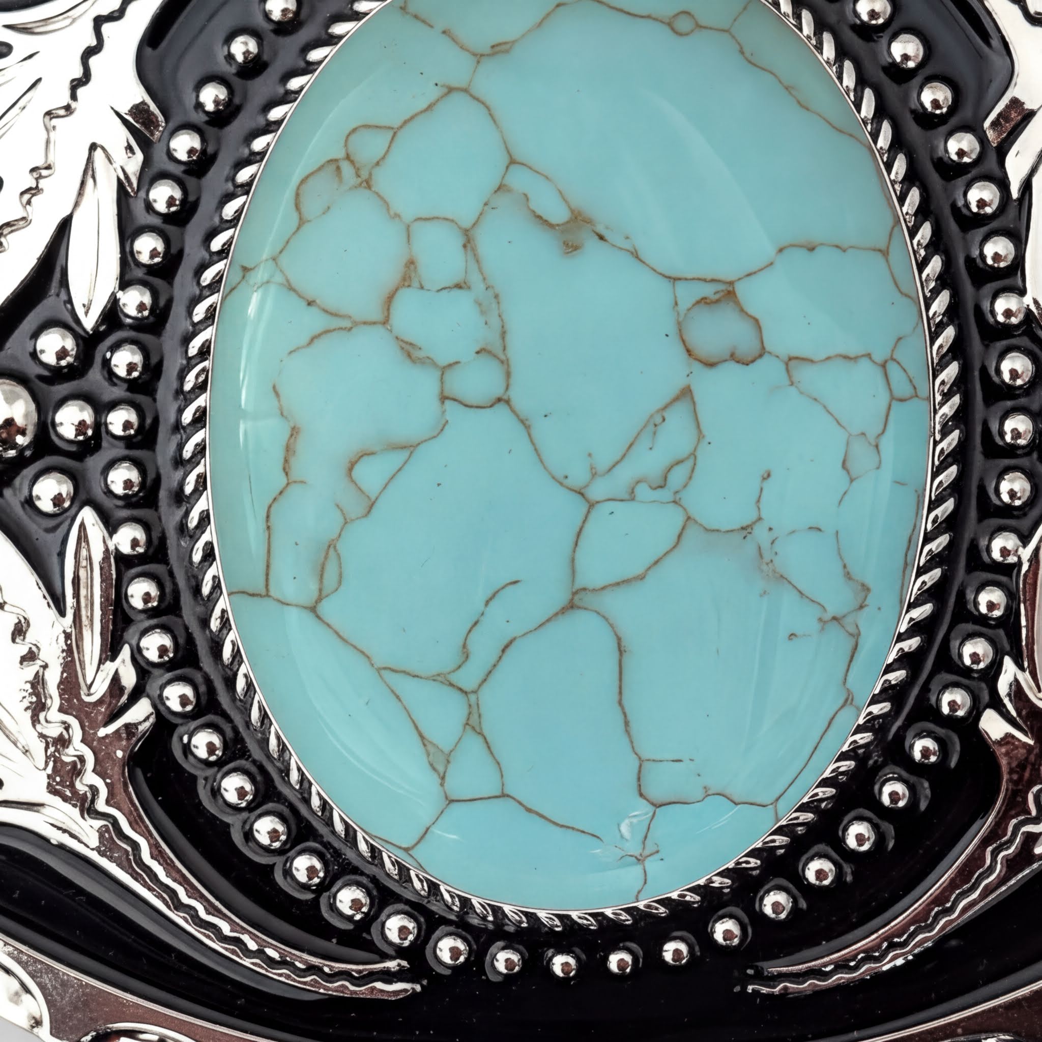 Two options for belt buckles: Option 1 has a leaf pattern and option 2 has flowers on it