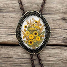 Wedding bolo tie with yellow flowers.
