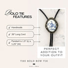 Silver back of a bolo tie with a clamp on a black leather cord