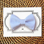 Load image into Gallery viewer, a blue and white striped bow tie on a card
