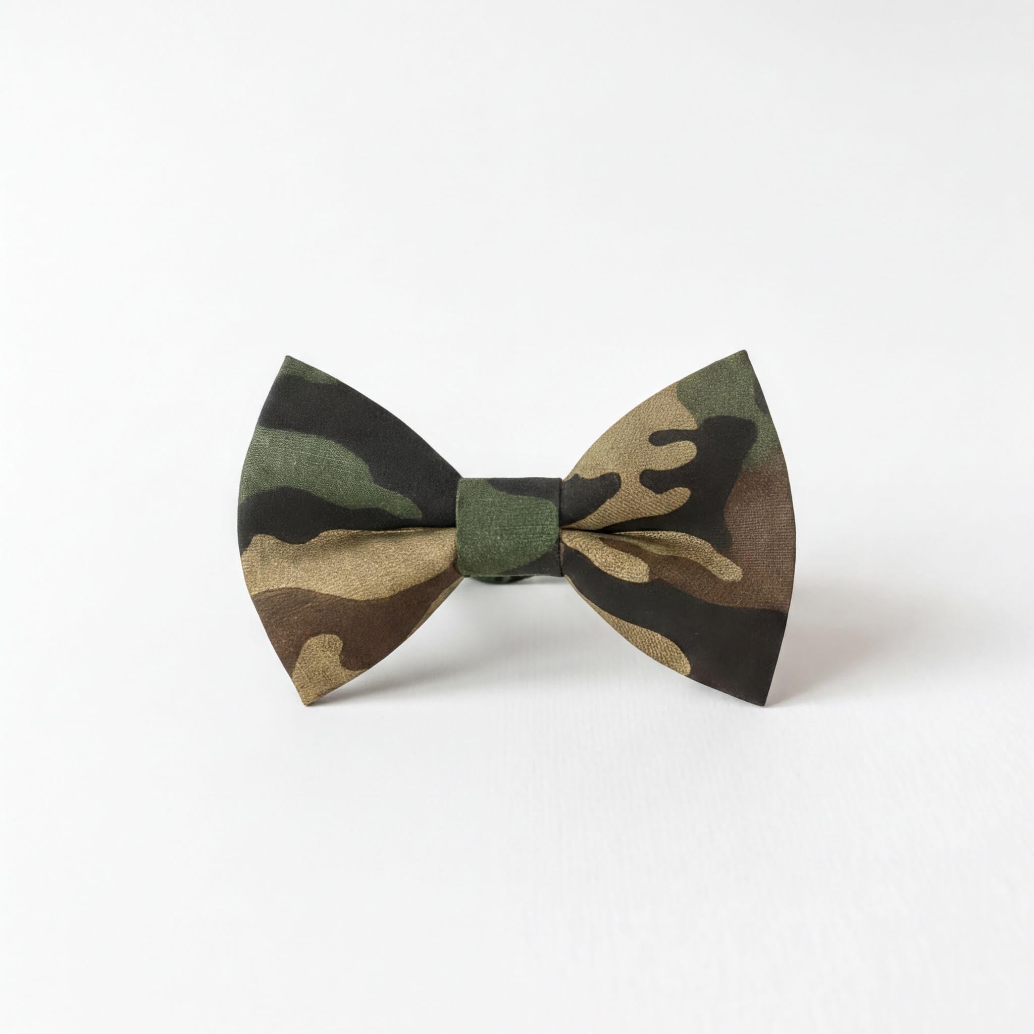 A camouflage bow tie with a dark green and brown pattern.