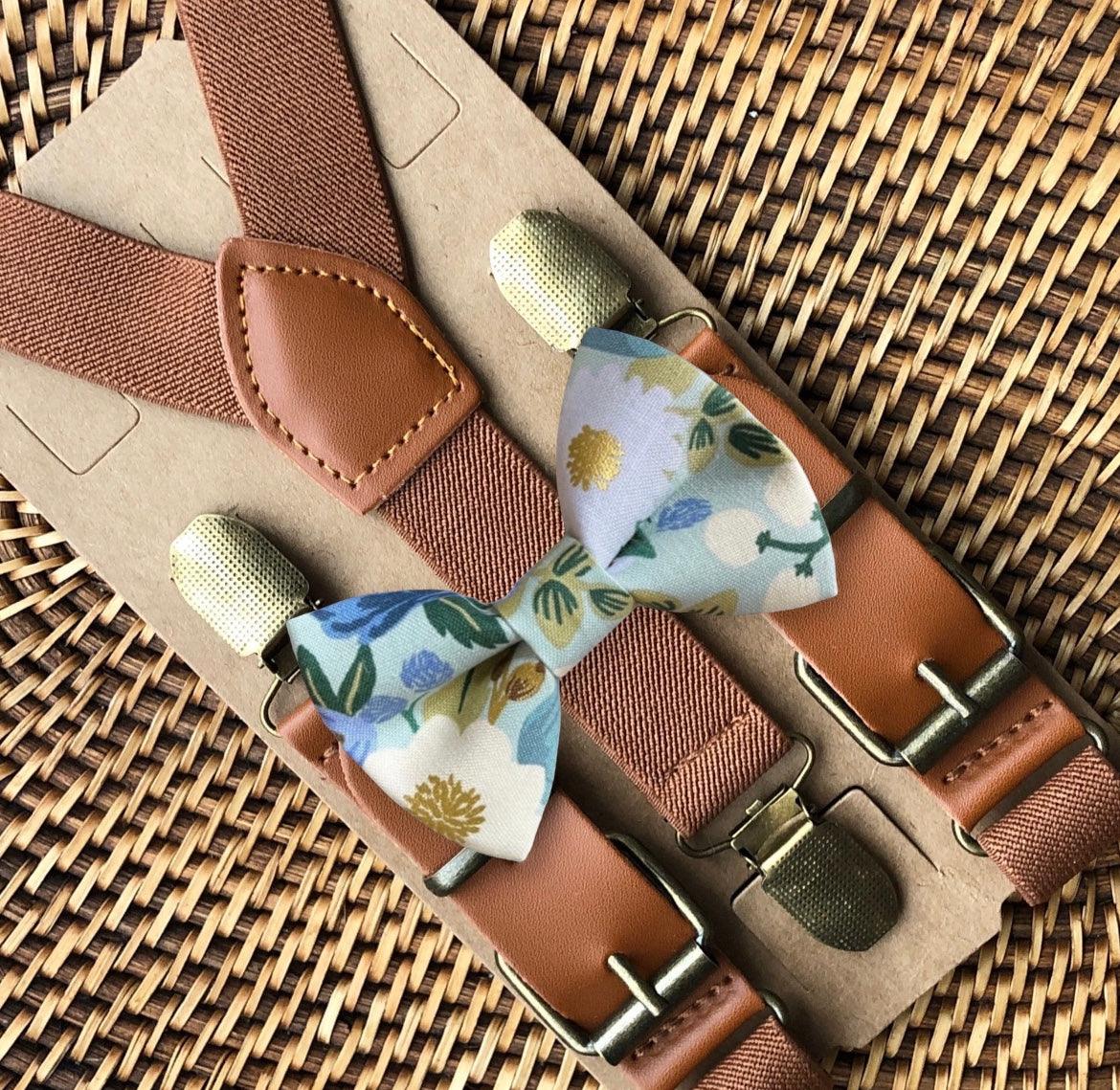 a pair of suspenders with a bow tie