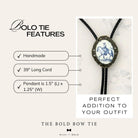 Silver back of a bolo tie with a clamp on a black leather cord