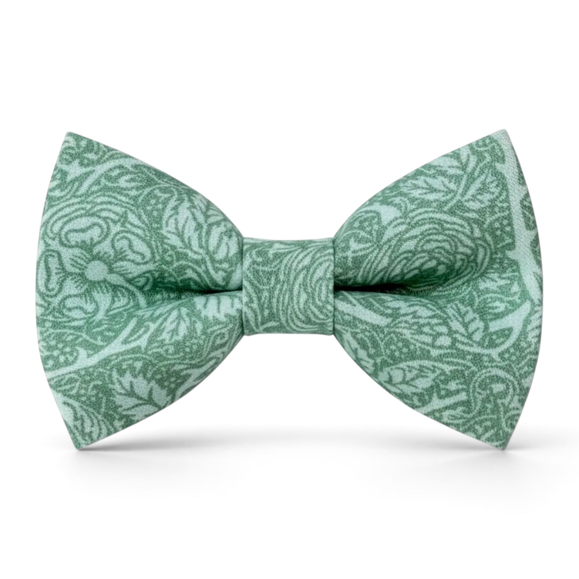 The Bold Bow Tie sage green cotton pre-tied bow tie with a delicate floral pattern for rustic wedding attire.