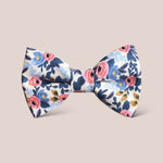 Load image into Gallery viewer, a bow tie with flowers on it

