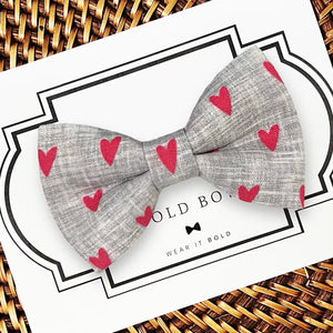a bow tie that has hearts on it