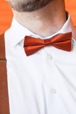 Load image into Gallery viewer, Satin Burnt Orange Bow Tie &amp; Cognac Buckle Suspenders Set
