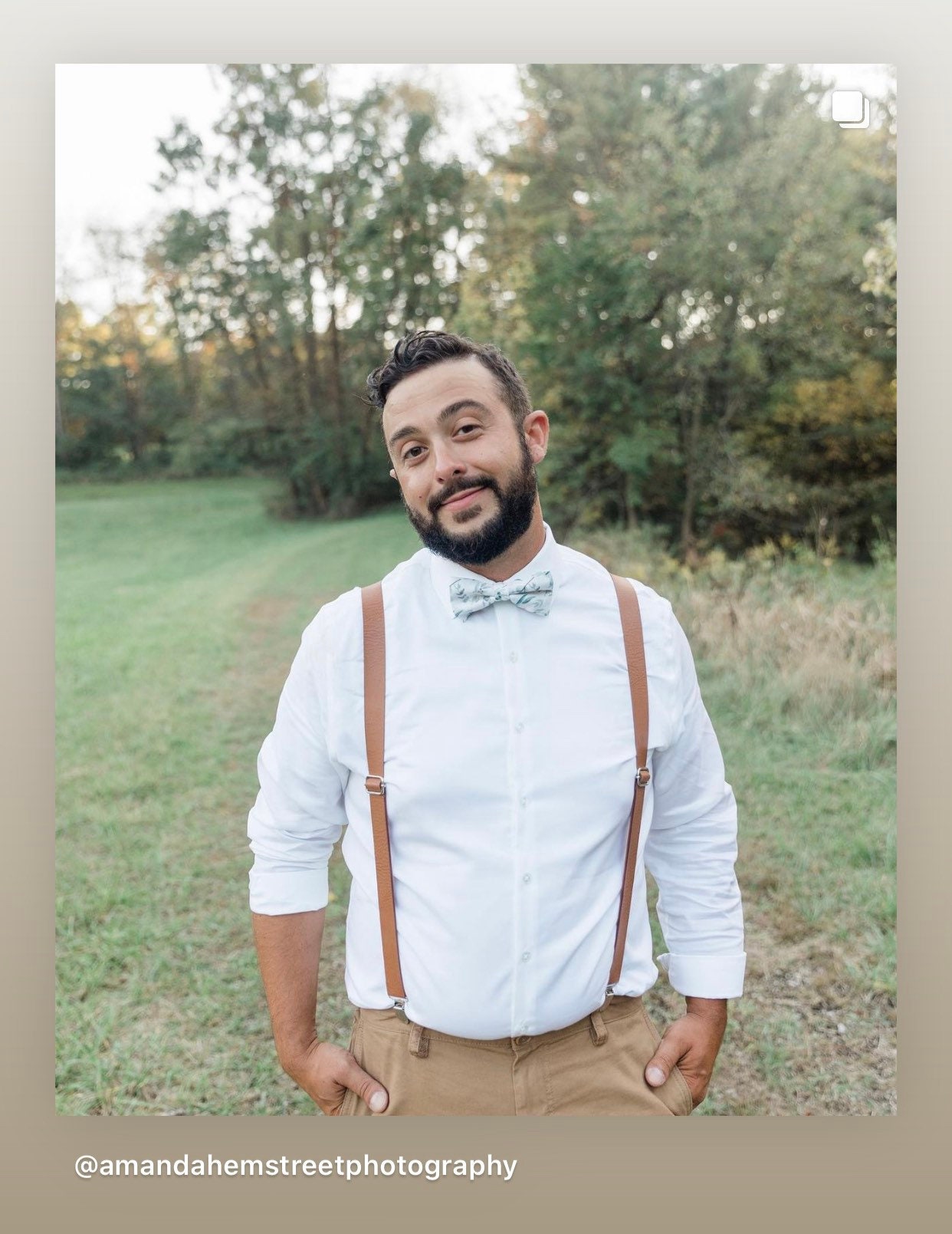 Groom waiting for his bride in brown vegan leather suspenders and sage floral bow tie.